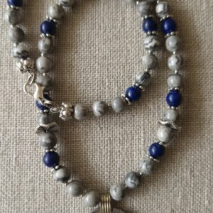 Kuchi hanger met oude munt en glazen kraal uit Afghanistan